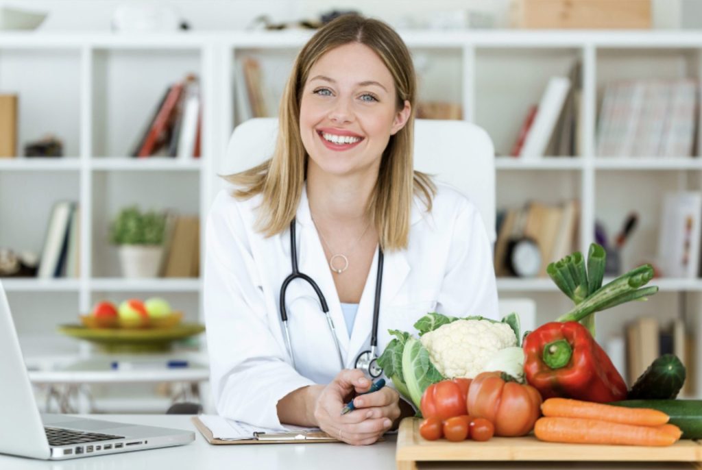 Nutritionist sitting at her desk.